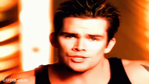 Close Up Of Man's Face With Yellow Background GIF