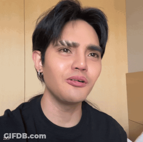 Close Up Of Man's Face With Zky Watermark GIF