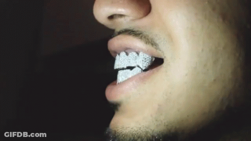 Close Up Of Man's Mouth With Diamond Teeth GIF