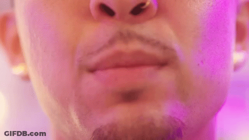 Close Up Of Man's Mouth With Gold Grills GIF