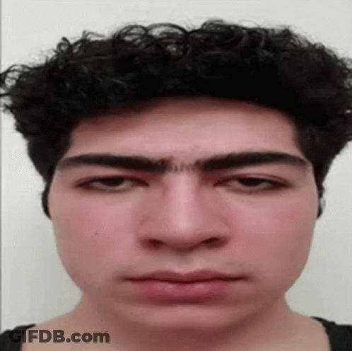 Close Up Of Man's Serious Face GIF