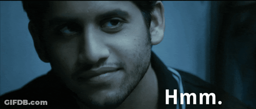 Close Up Of Man Saying Hmm GIF