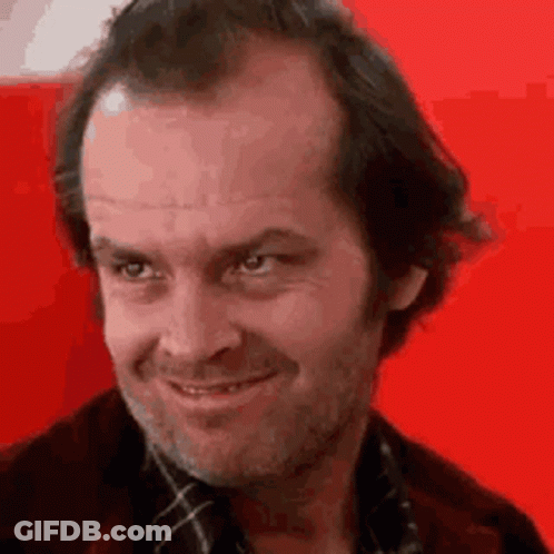 Close Up Of Man Smiling On Red Background GIF