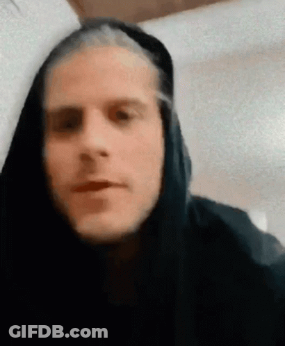 Close Up Of Man Wearing Black Hooded Jacket GIF