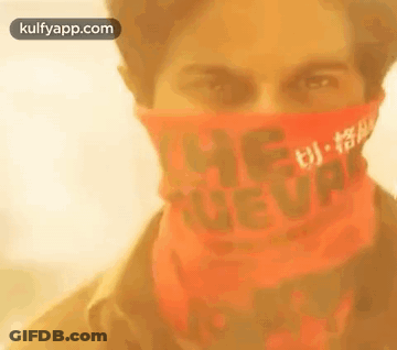 Close Up Of Man Wearing Red Bandana GIF