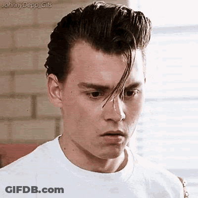 Close Up Of Man White Shirt Ponytail GIF