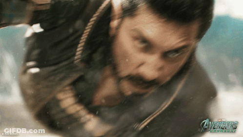 Close Up Of Man With Avengers Text GIF