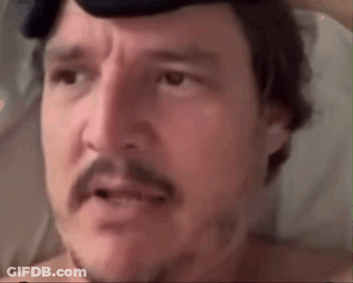 Close Up Of Man With Beard And Mustache Wearing Hat GIF