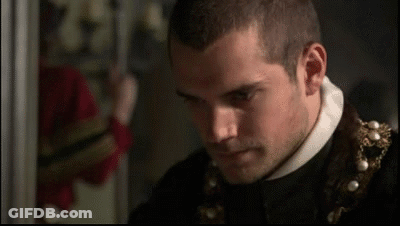 Close Up Of Man With Beard And Pearl Necklace GIF