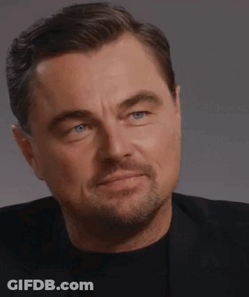 Close Up Of Man With Beard In Black Shirt And Suit GIF