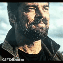 Close Up Of Man With Beard In Leather Jacket GIF