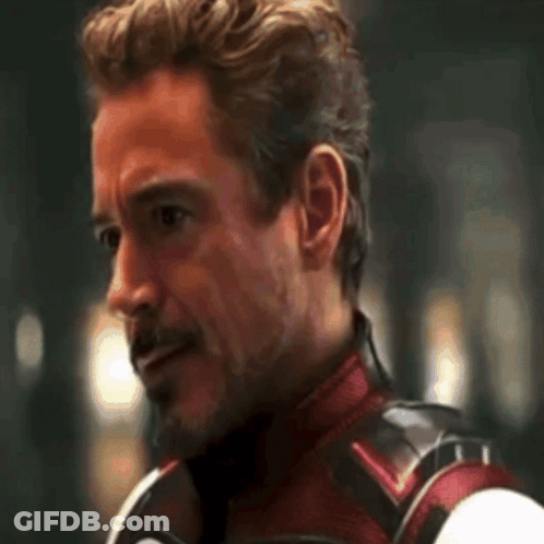 Close Up Of Man With Beard In Superhero Suit GIF