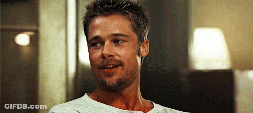 Close Up Of Man With Beard In White Shirt GIF