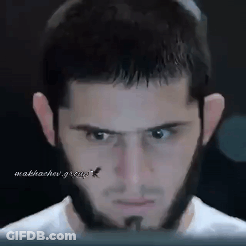 Close Up Of Man With Beard Looking At Camera GIF