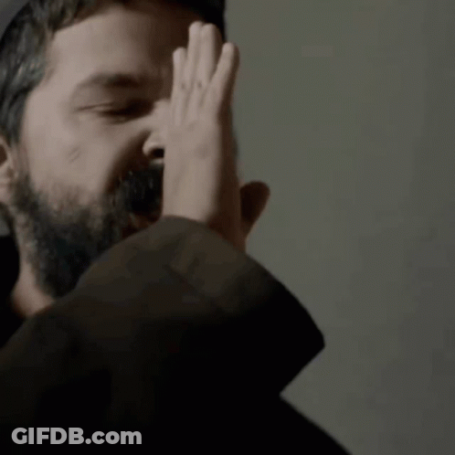 Close Up Of Man With Beard Making Funny Face GIF