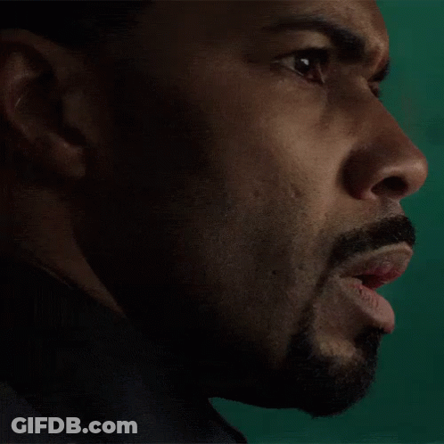 Close Up Of Man With Beard On Green Background GIF
