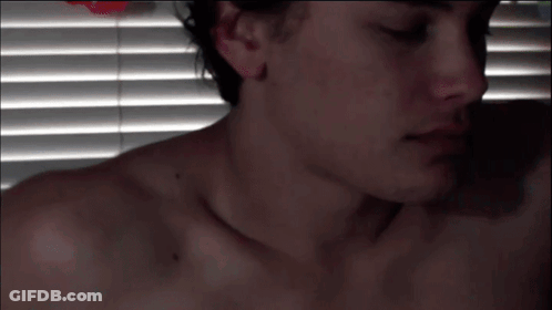 Close Up Of Man With Blind Behind Him GIF