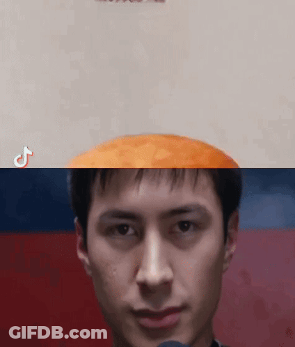 Close Up Of Man With Burger On Face GIF