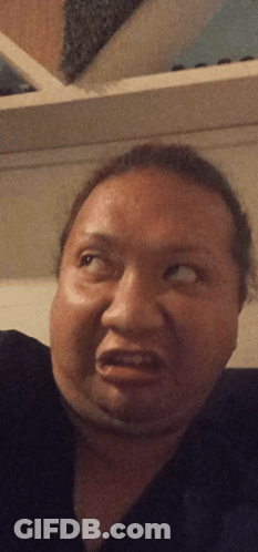 Close Up Of Man With Ear Buds GIF