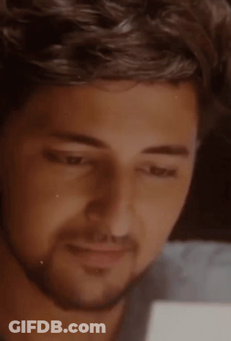 Close Up Of Man With Eyes Closed And Beard GIF