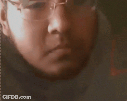 Close Up Of Man With Glasses GIF