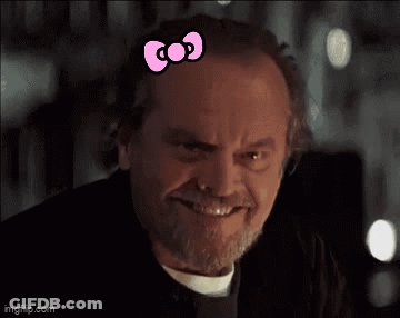 Close Up Of Man With Hello Kitty Bow GIF