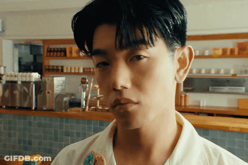Close Up Of Man With I Love You Sticker On Shirt GIF