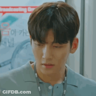 Close Up Of Man With Lanyard And Blue Shirt GIF