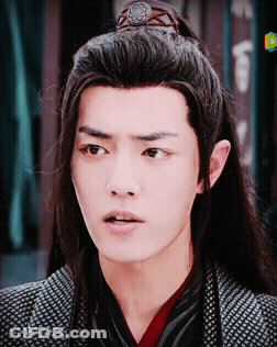 Close Up Of Man With Long Hair And Ponytail GIF