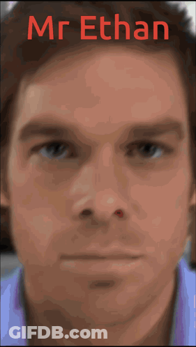 Close Up Of Man With Mr. Ethan In Red Letters GIF