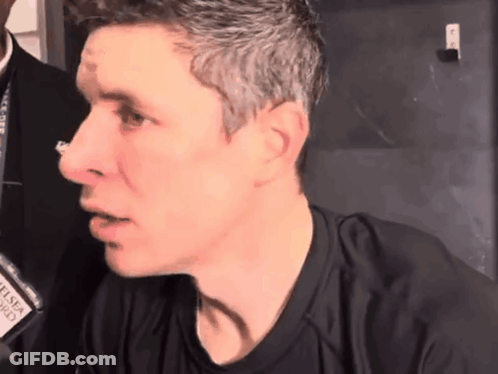 Close Up Of Man With Name Tag Saying G GIF