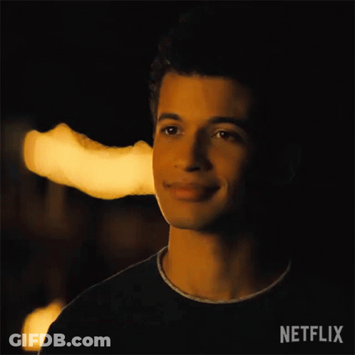 Close Up Of Man With Netflix Logo GIF