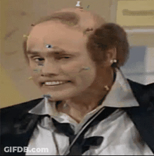 Close Up Of Man With Pins In Head GIF