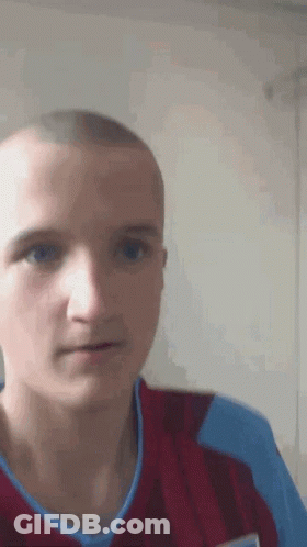 Close Up Of Man With Shaved Head GIF