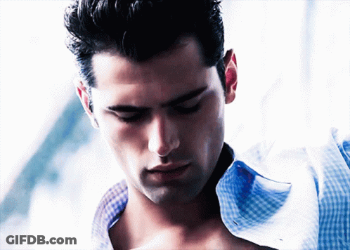 Close Up Of Man With Shirt Open GIF