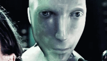 Close Up Of Man With Woman Behind Him GIF