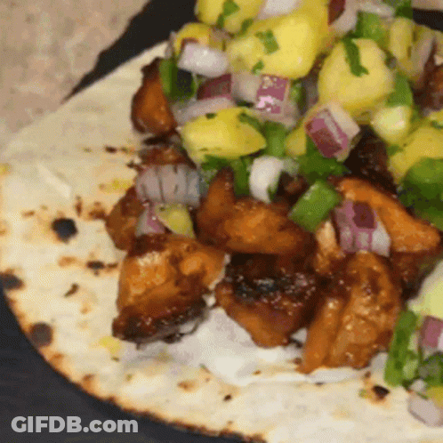 Close Up Of Meat And Vegetable Tortilla GIF