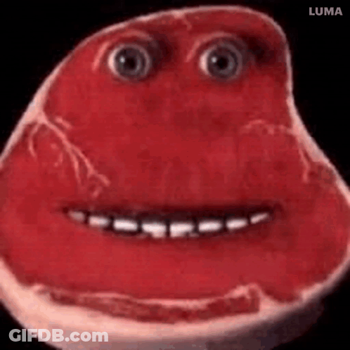 Close Up Of Meat With Smiley Face GIF