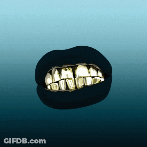Close Up Of Mouth With Gold Teeth GIF