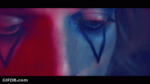 Close Up Of Mouth With Red And Blue Lighting GIF