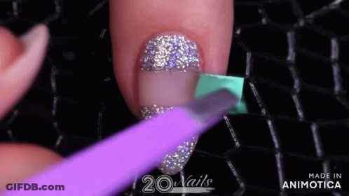 Close Up Of Nails With Purple Light GIF