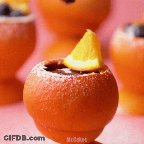 Close Up Of Orange With Slice GIF