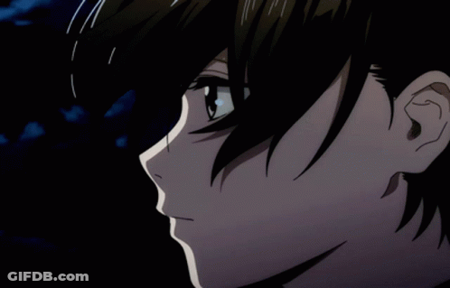 Close Up Of Person Face On Black Background GIF
