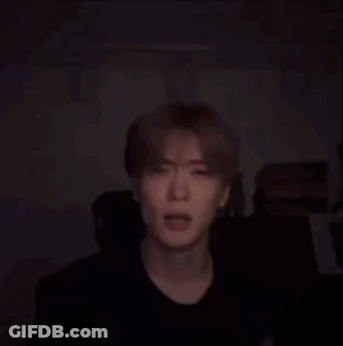Close Up Of Person Face With Black Background GIF