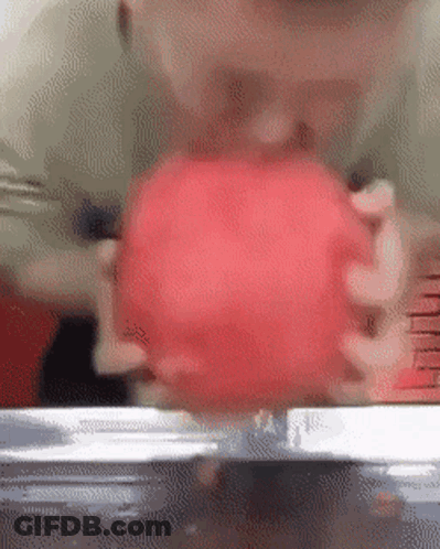 Close Up Of Person Holding Red Apple GIF