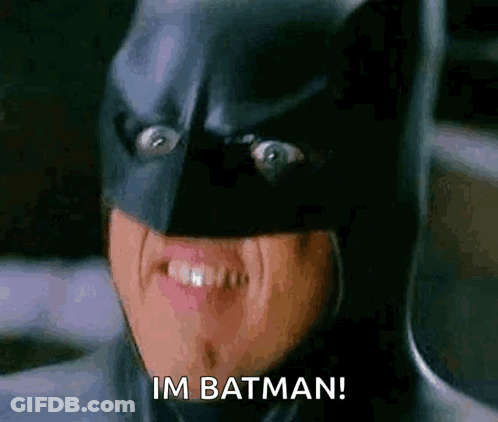 Close Up Of Person In Batman Mask Saying Im Batman GIF