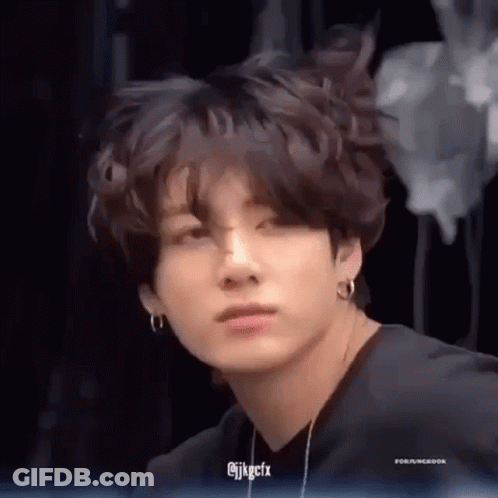 Close Up Of Person In Black Shirt GIF