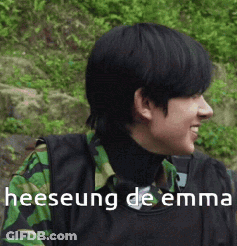 Close Up Of Person In Camouflage Vest And Turtleneck GIF