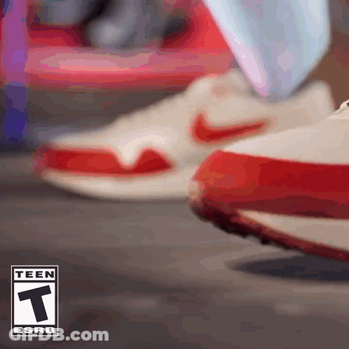 Close Up Of Person In Red And White Nike Shoes GIF
