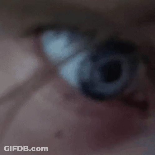 Close Up Of Person's Blue Eye GIF